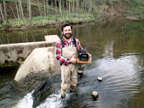 Capturing footage of migrating Sakhalin taimen on Japan's Sarufutsu River.